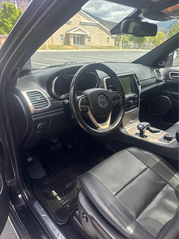 
								2014 Jeep Grand Cherokee Summit Sport Utility 4D full									